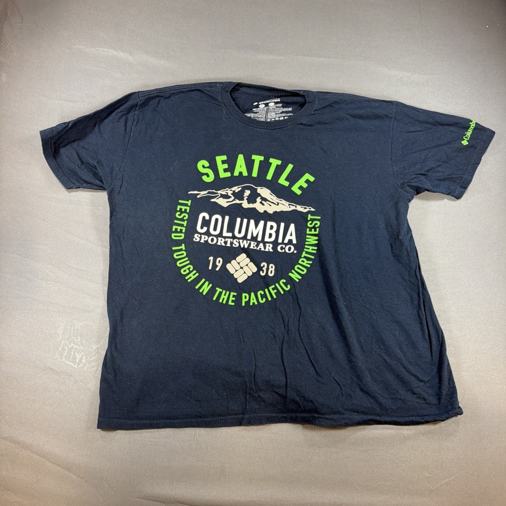 Blue Columbia Sportswear graphic t-shirt featuring a mountain logo and Seattle